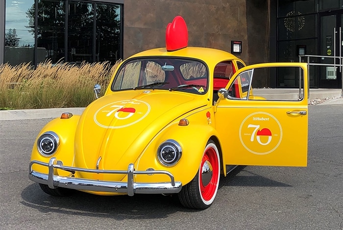 New emblem, an electrified yellow 1967 Beetle