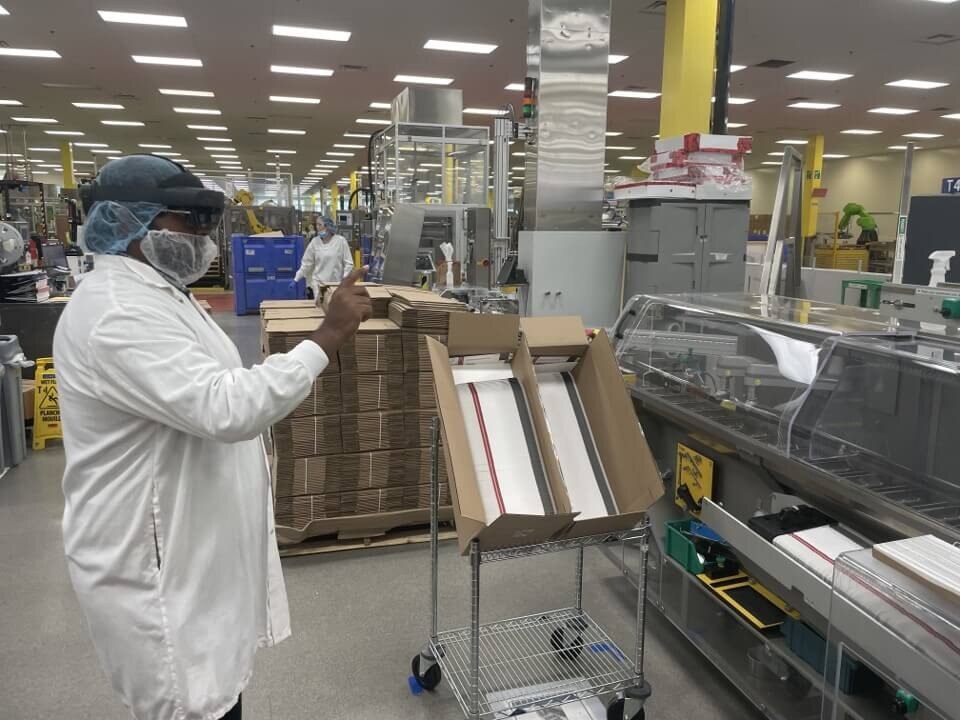 Employee using Augmented Reality (DeepSight) for Training