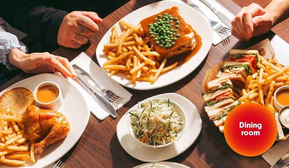 Various St-Hubert Meals on a table