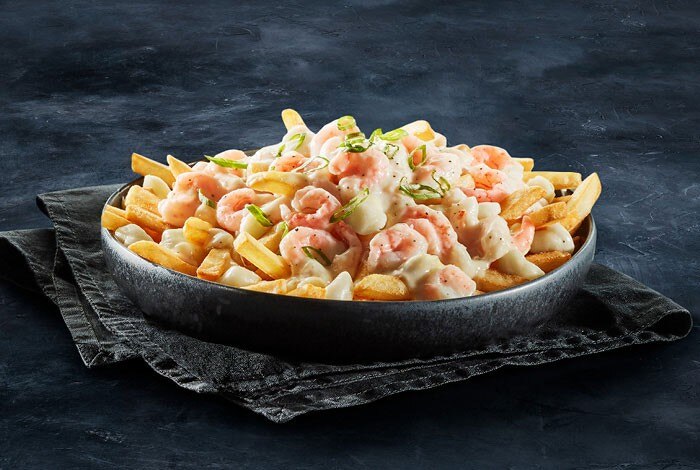 Shrimp poutine plate from St-Hubert restaurants
