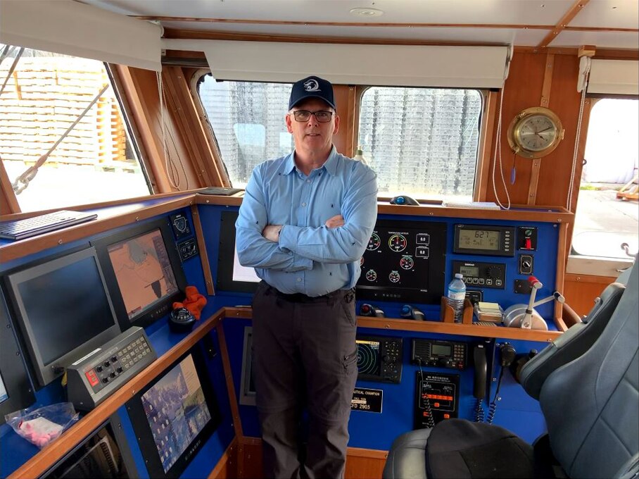 Fisherman inside a boat
