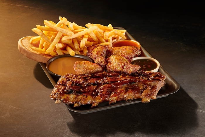 Image of half rack of ribs and four wings