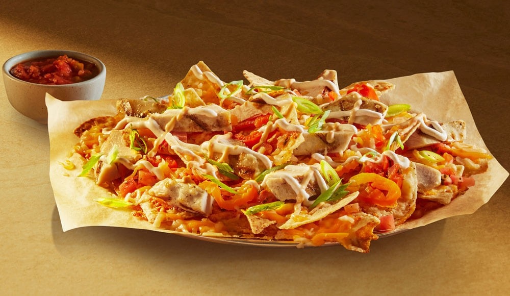 Nachos to share as an appetizer, available in St-Hubert traditional rotisseries