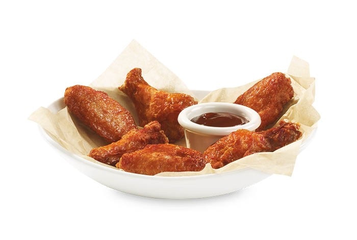 6 ailes de poulet gratuits à l’achat de 30$ ou plus**