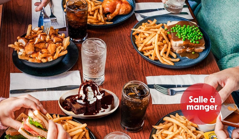 Table avec différents repas St-Hubert